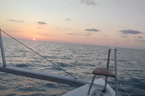 Slide: The Image of Sunset view from 2016 Nautitech 40 Open catamaran on the ocean. - 31