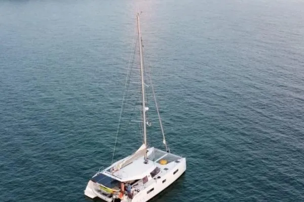 Slide: The Image of 2016 Nautitech 40 Open catamaran sailing on calm ocean waters. - 35