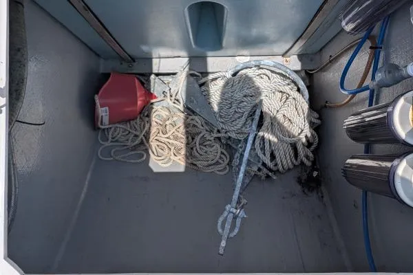 Slide: The Image of Storage compartment on a 2016 Nautitech 40 Open, featuring ropes, anchor, and funnel. - 45