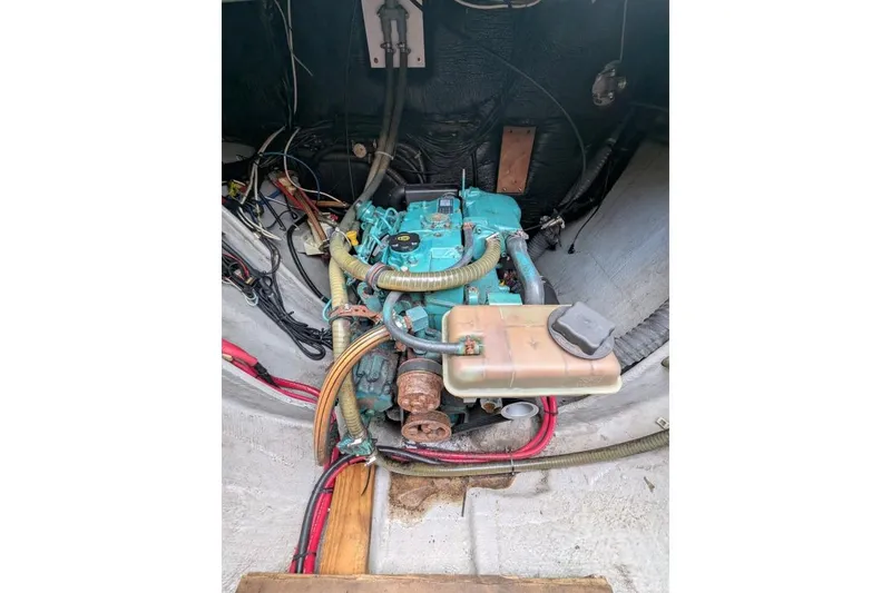Slide: The Image of Engine compartment of a 2016 Nautitech 40 Open catamaran, showcasing mechanical components. - 51