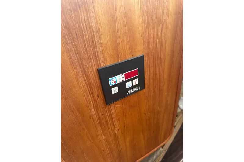 Slide: The Image of Control panel on 2008 Ranger Tugs R-25 Classic wooden interior. - 8