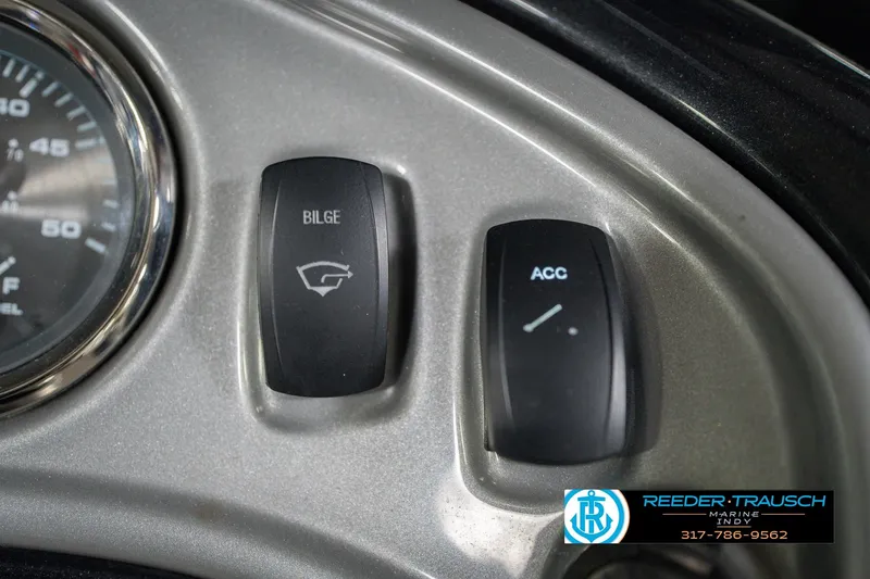 Slide: The Image of Control panel of 2020 Sun Tracker Party Barge 24 DLX with bilge and accessory switches. - 41