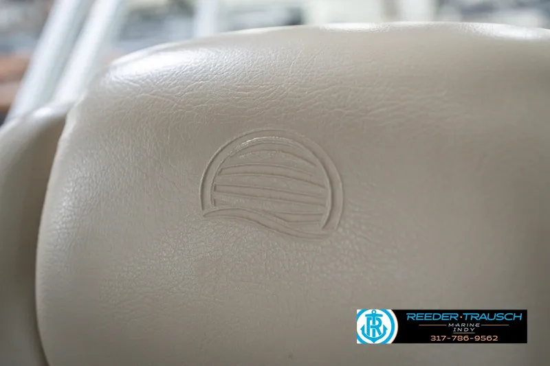 Slide: The Image of Beige leather seat with embossed logo on Sun Tracker Party Barge 24 DLX, 2020 model. - 44