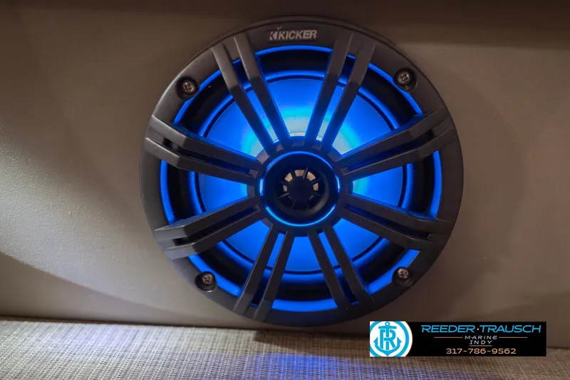 Slide: The Image of Blue LED-lit Kicker speaker on 2020 Sun Tracker Party Barge 24 DLX. - 48