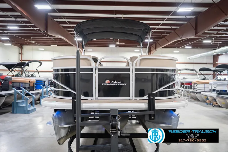 Slide: The Image of 2020 Sun Tracker Party Barge 24 DLX pontoon boat in indoor showroom. - 5