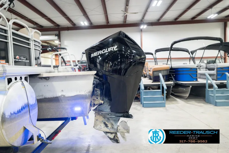 Slide: The Image of 2020 Sun Tracker Party Barge 24 DLX with Mercury outboard motor in showroom. - 51