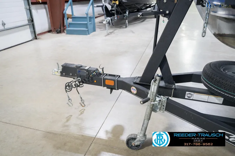 Slide: The Image of Trailer hitch of a 2020 Sun Tracker Party Barge 24 DLX in a showroom. - 58