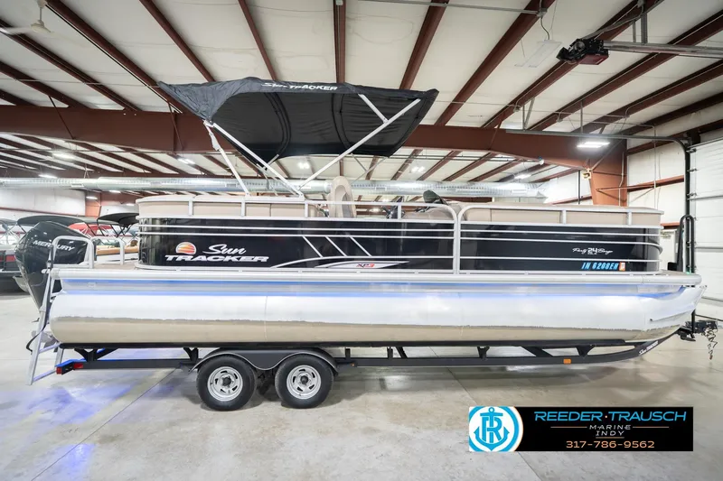 Slide: The Image of 2020 Sun Tracker Party Barge 24 DLX pontoon boat in indoor showroom. - 7