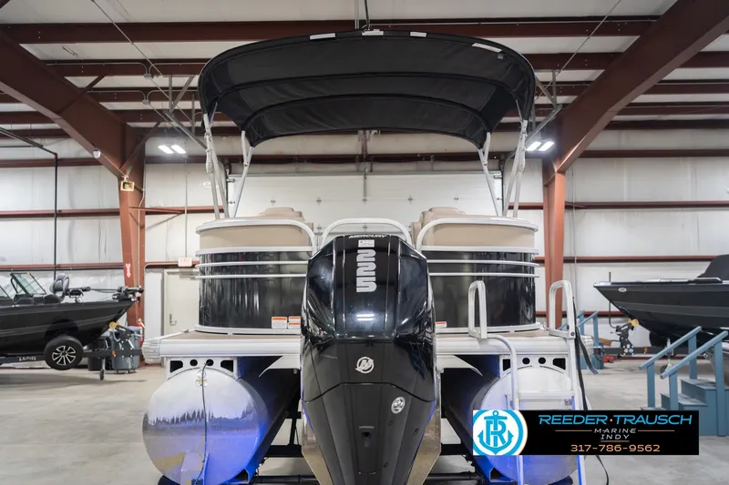 Slide: The Image of 2020 Sun Tracker Party Barge 24 DLX pontoon boat in indoor showroom. - 9