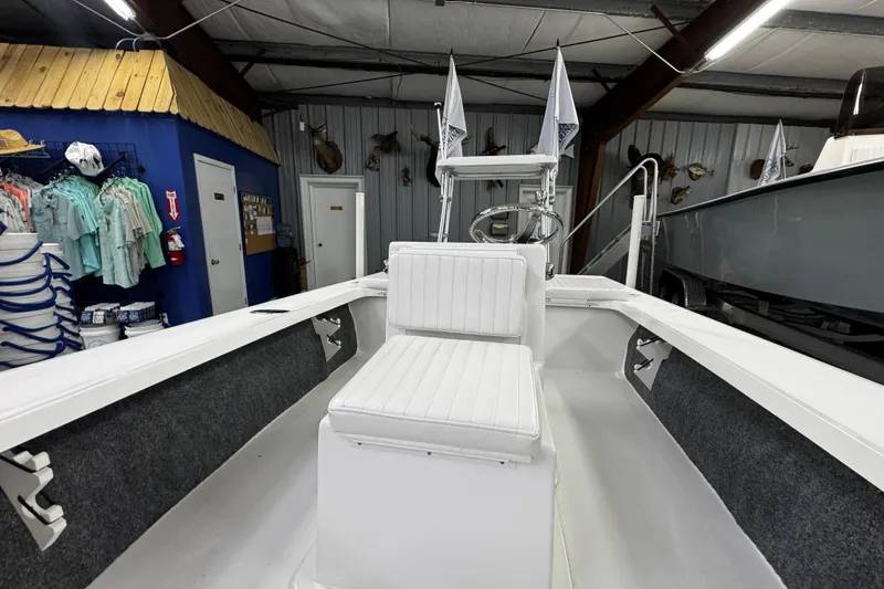 Slide: The Image of Interior view of 2026 Mitzi Skiffs 17 Tournament boat, featuring storage compartment. - 13