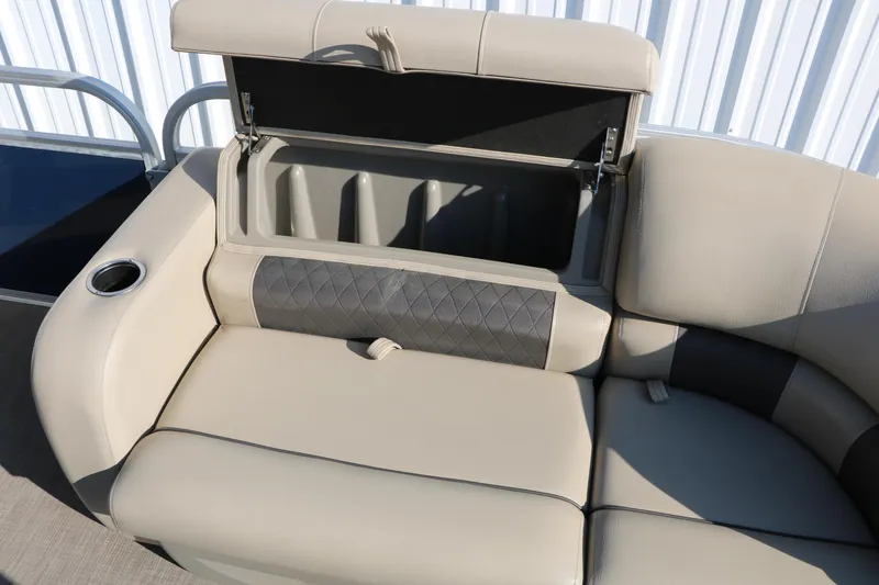 Slide: The Image of 2022 Sun Tracker Party Barge 22 RF XP3 seating with storage compartment open. - 24