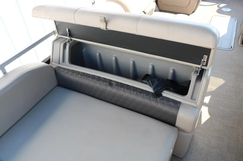 Slide: The Image of 2022 Sun Tracker Party Barge 22 RF XP3 storage compartment with cushioned seating. - 27