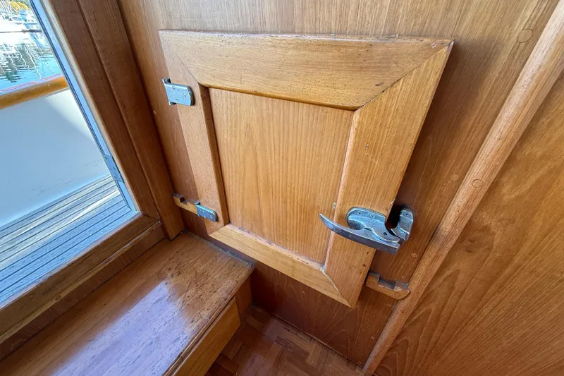 Slide: The Image of Wooden interior door with latch on 1988 Grand Banks Heritage CL boat. - 20
