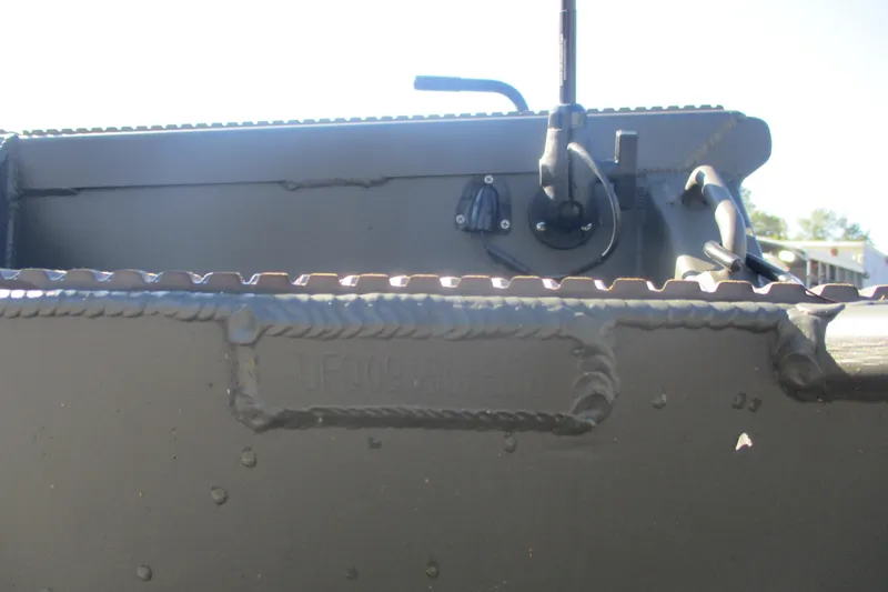 Slide: The Image of Close-up of 2026 Gator Tail 1748 Gator Series boat hull with visible welding details. - 11
