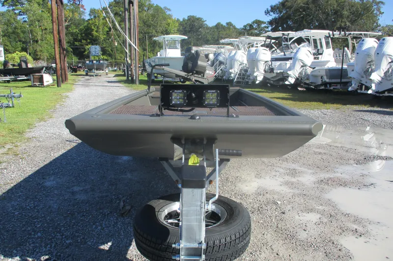 Slide: The Image of 2026 Gator Tail 1748 Gator Series boat on trailer in outdoor lot. - 2