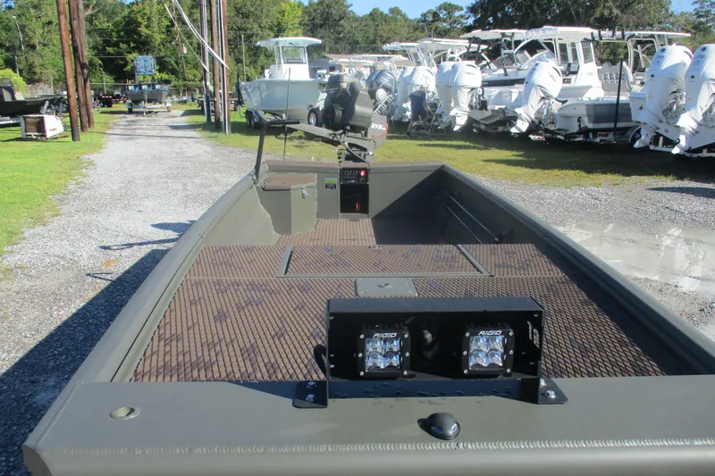 Slide: The Image of 2026 Gator Tail 1748 Gator Series boat in a marina with other vessels. - 7