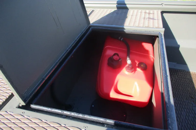 Slide: The Image of Open storage compartment with red fuel tank in 2026 Gator Tail 1748 Gator Series boat. - 8