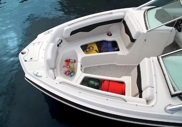 Slide: The Image of Manufacturer Provided Image: 2011 Chaparral 226 SSi boat interior with seating and storage compartments. - 16