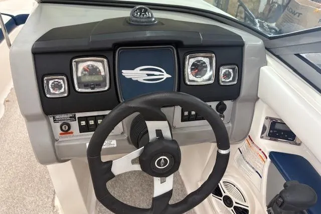 Slide: The Image of 2011 Chaparral 226 SSi boat dashboard with steering wheel and instrument panel. - 7