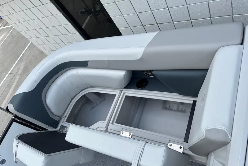 Slide: The Image of 2026 Godfrey Sweetwater 2086 SB boat interior with open storage compartments. - 13
