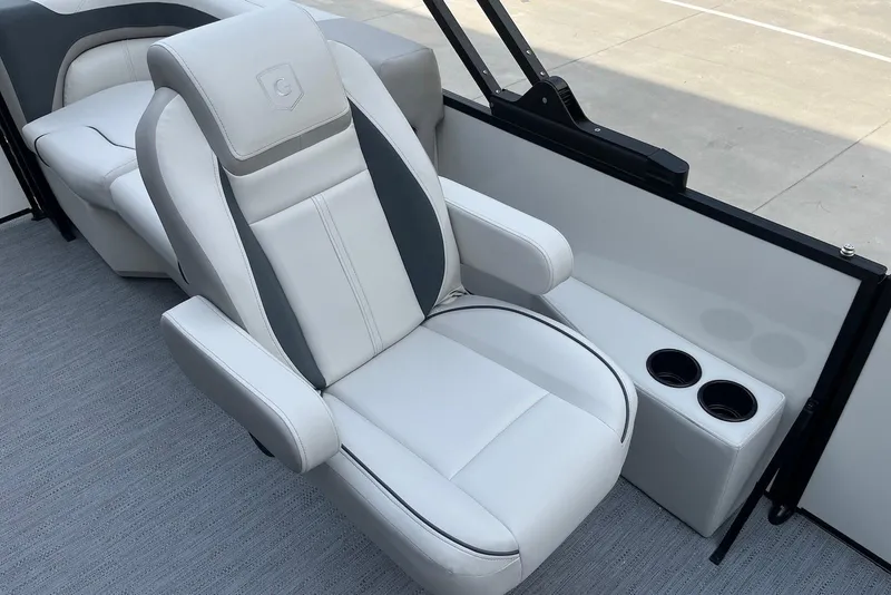 Slide: The Image of Luxurious seating on 2026 Godfrey Sweetwater 2086 SB boat with cup holders. - 18
