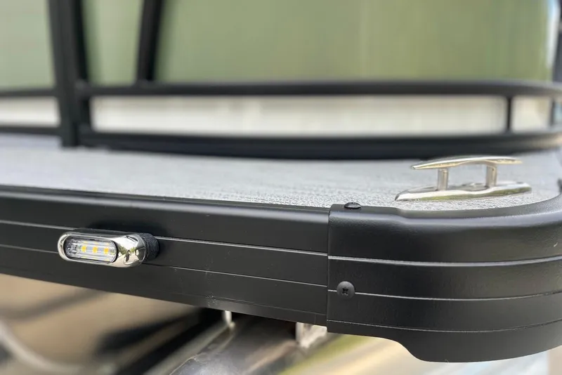 Slide: The Image of 2026 Godfrey Sweetwater 2086 SB boat detail with LED light and cleat. - 21