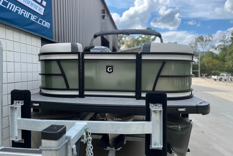 Slide: The Image of 2026 Godfrey Sweetwater 2086 SB pontoon boat on trailer, outdoor setting. - 4