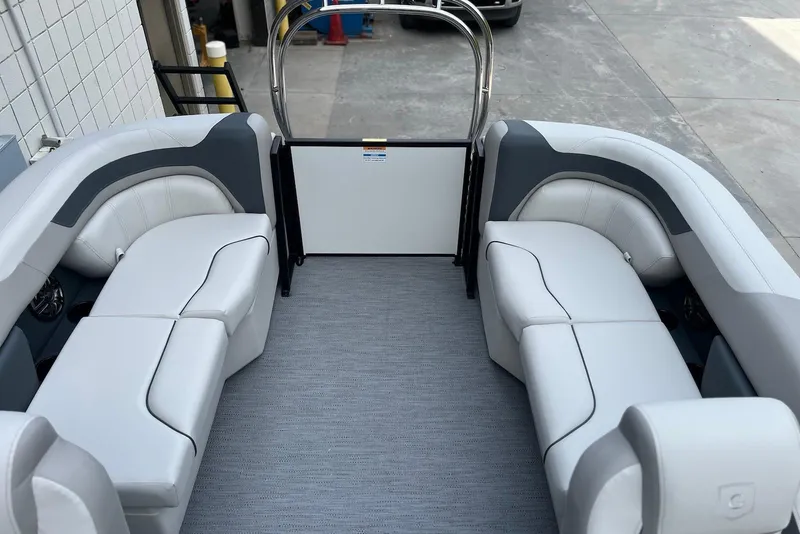 Slide: The Image of 2026 Godfrey Sweetwater 2086 SB boat interior with sleek white seating and modern design. - 8