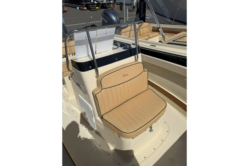 Slide: The Image of 2026 Rossiter 17 CC boat with tan seating and sleek design. - 10
