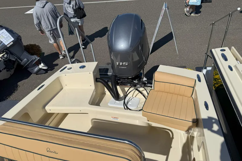 Slide: The Image of 2026 Rossiter 17 CC boat with Yamaha 115 engine, beige seating, and sleek design. - 12