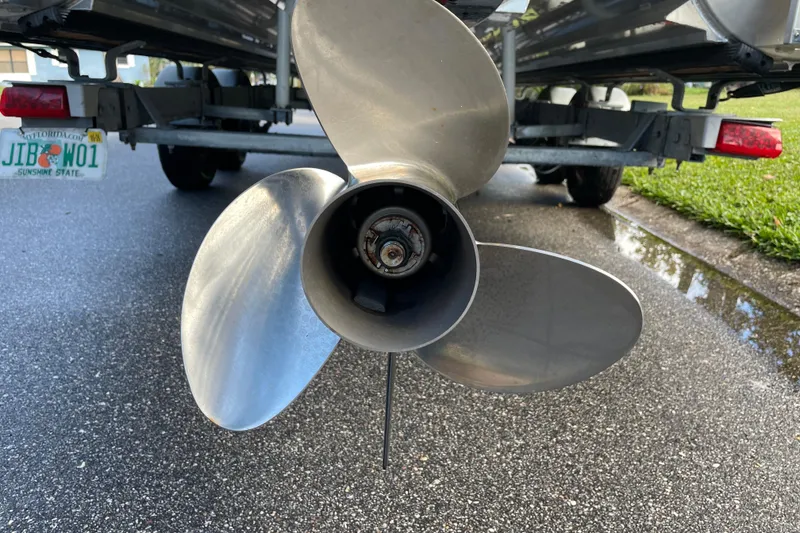 Slide: The Image of Propeller of 2022 Barletta Cabrio 22QC boat on trailer, close-up view. - 17