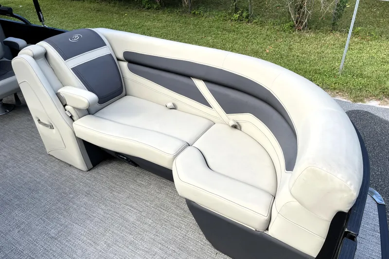 Slide: The Image of Luxurious seating on 2022 Barletta Cabrio 22QC pontoon boat, featuring elegant upholstery. - 23