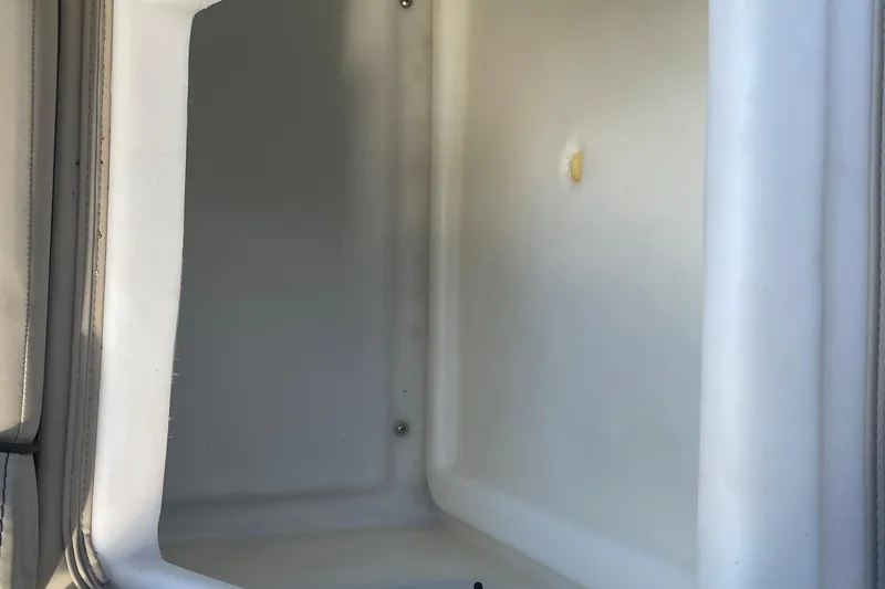 Slide: The Image of Interior storage compartment of 2022 Barletta Cabrio 22QC boat. - 43