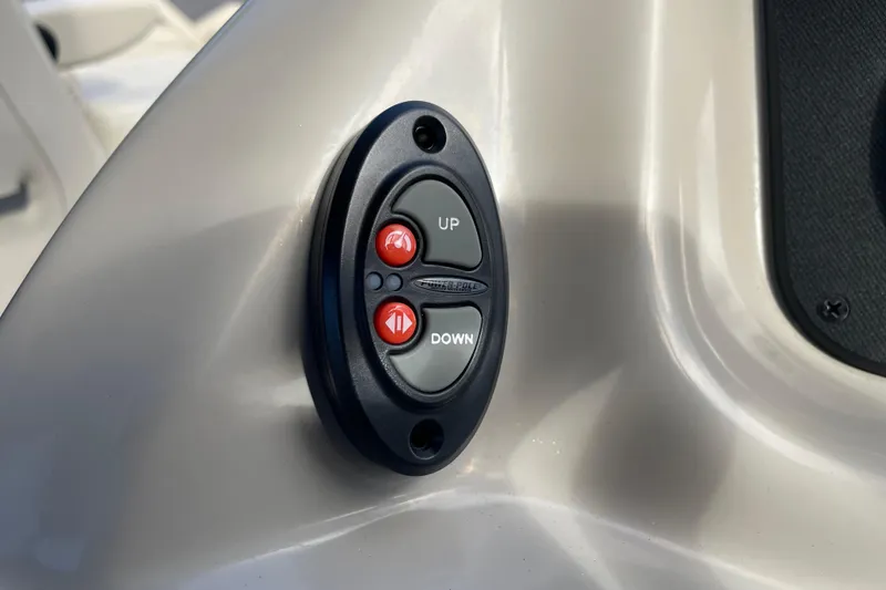 Slide: The Image of Control panel with up and down buttons on 2022 Barletta Cabrio 22QC boat. - 46