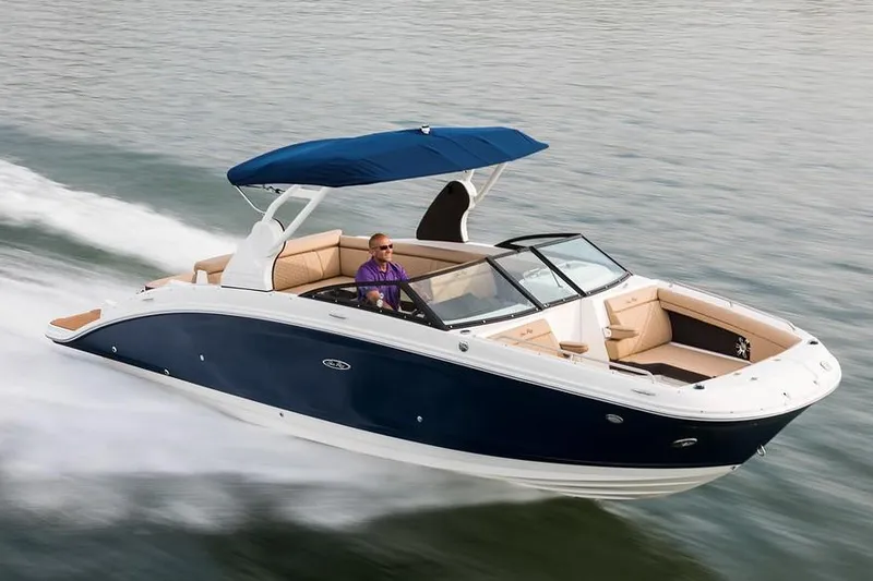 The Image of Manufacturer Provided Image: 2019 Sea Ray SDX 270 boat cruising on water with blue canopy. - 0