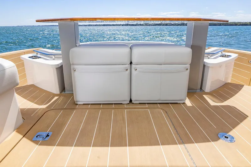 Slide: The Image of Manufacturer Provided Image: 2025 Tiara Yachts EX 54 deck with seating and ocean view. - 13