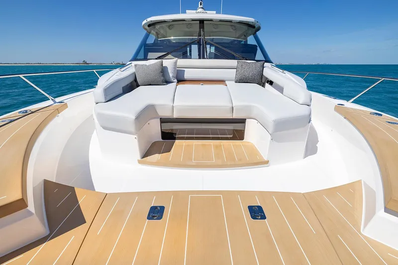 Slide: The Image of Manufacturer Provided Image: 2025 Tiara Yachts EX 54 luxury yacht with spacious deck and elegant seating. - 6