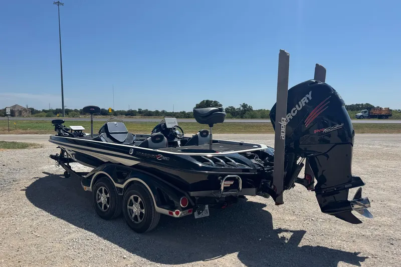 Slide: The Image of 2014 Ranger Z521 Comanche boat with Mercury engine on a trailer. - 2