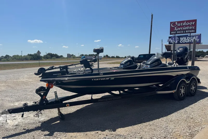 Slide: The Image of 2014 Ranger Z521 Comanche boat on trailer at outdoor dealership. - 3