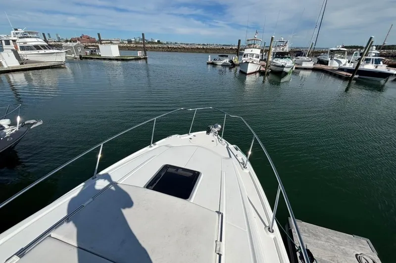 Slide: The Image of Bow view of 2011 CHAPPARELL Signature 330 yacht docked in a marina. - 6
