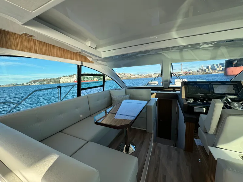 Slide: The Image of Interior of 2024 Cruisers Yachts 50 Cantius with waterfront view. - 16