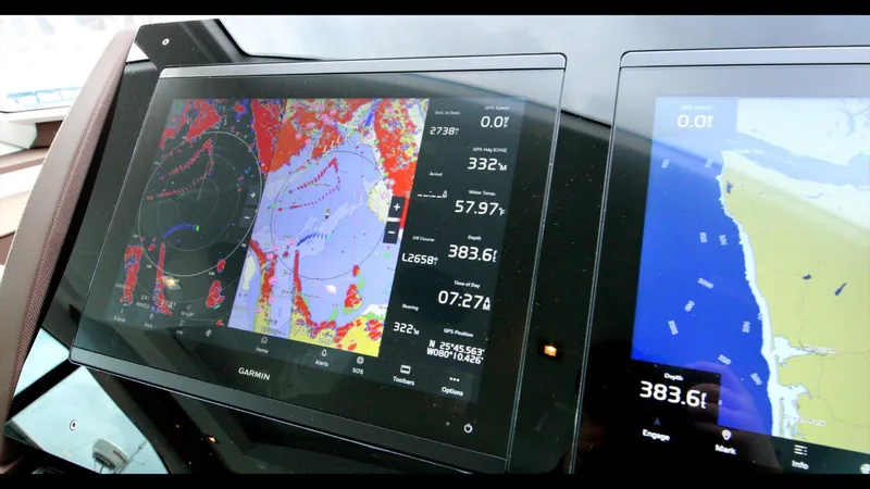 Slide: The Image of 2024 Cruisers Yachts 50 Cantius navigation display showing detailed marine charts and data. - 40