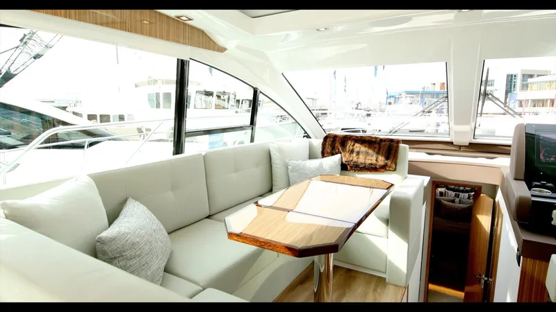 Slide: The Image of Luxurious interior of the 2024 Cruisers Yachts 50 Cantius with plush seating and modern design. - 41