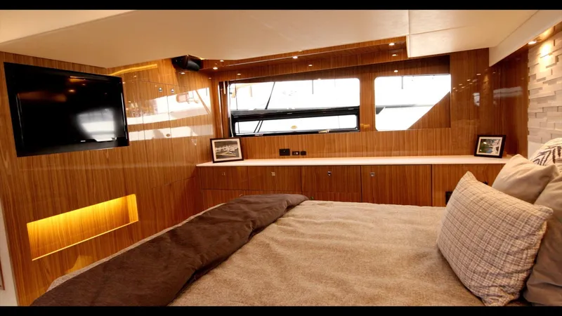 Slide: The Image of Luxurious bedroom interior of 2024 Cruisers Yachts 50 Cantius with modern amenities. - 46