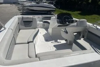 Slide: The Image of 2022 Hurricane SS 192RL boat interior with seating and steering console. - 7