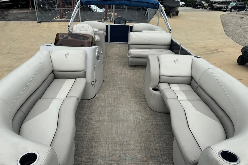 Slide: The Image of 2022 Cypress Cay Seabreeze 232 pontoon boat with spacious seating and modern design. - 7