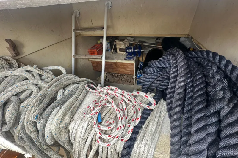 Slide: The Image of Coiled ropes and equipment in Schooner Leopard, 1994 Pilot model. - 84