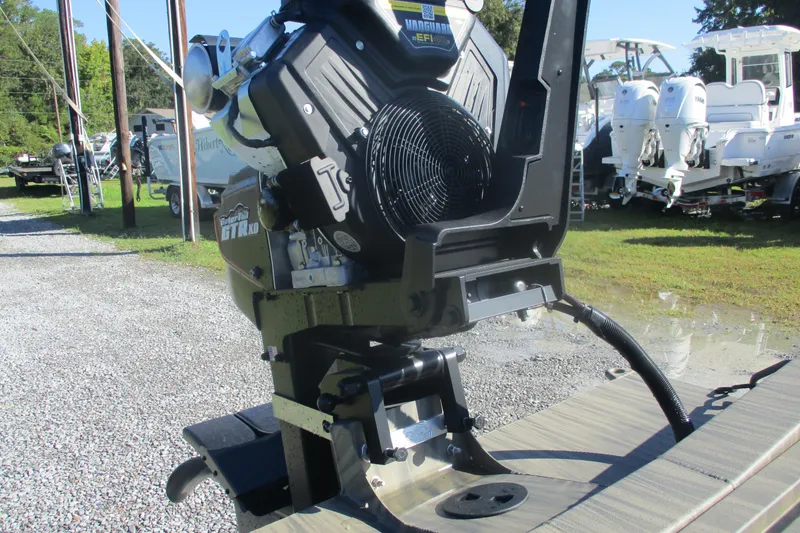 Slide: The Image of 2026 Gator Tail 1754 Extreme boat motor in outdoor setting, showcasing powerful engine design. - 11