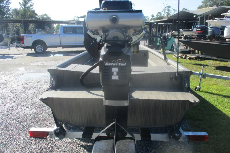 Slide: The Image of 2026 Gator Tail 1754 Extreme boat with powerful engine, parked outdoors. - 12