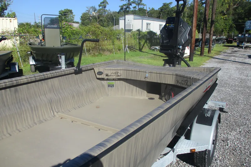 Slide: The Image of 2026 Gator Tail 1754 Extreme boat on trailer, parked outdoors. - 5